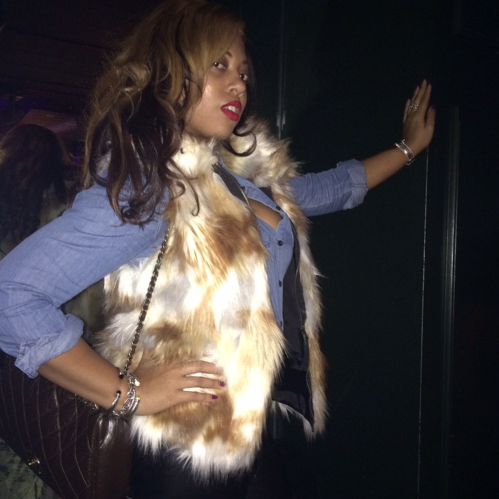 Multi color Faux fur vest. Size L.